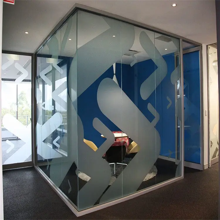 Frosted glass signage on an office glass partition.